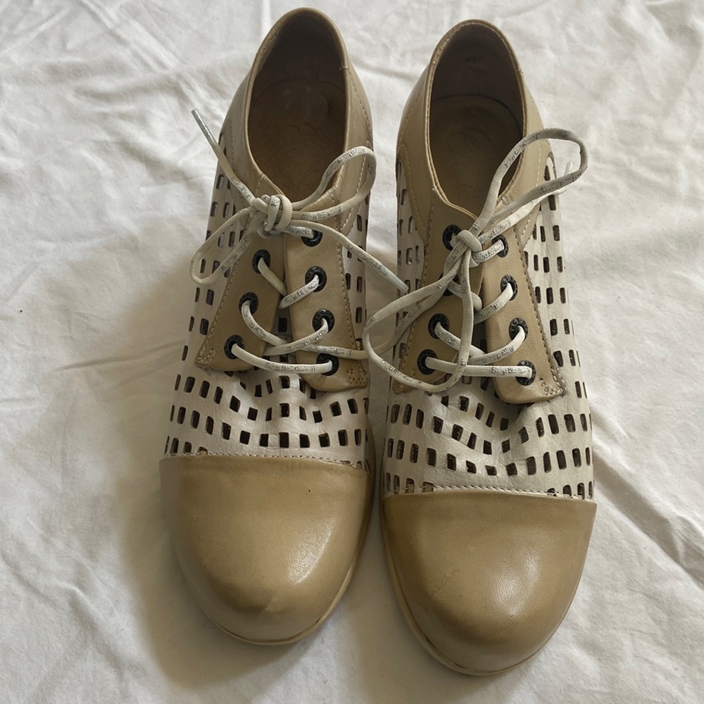 Fun whimsical cut out leather oxfords.  Worn once!
